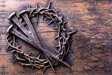 Crown Of Thorns And Nails Engraved On Stone