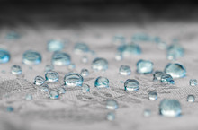 Blue Drops On Water Resistance Surface Of Textile Fabric Fibers. Macro 