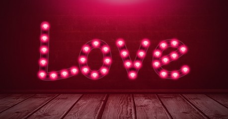 Poster - Love text glowing neon light bulbs over wooden floor