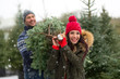 © pikselstock - Picking the Christmas tree