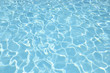 © peangdao - Blue and bright water in swimming pool with sun reflection, Motion of ripple water and gentle wave in pool