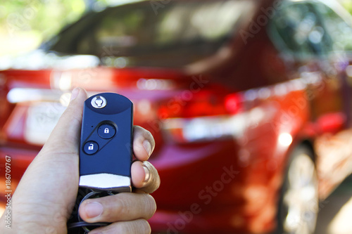 Hand Holding Car Remote Key Concept For Technology