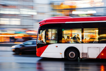 driving bus in the city at night