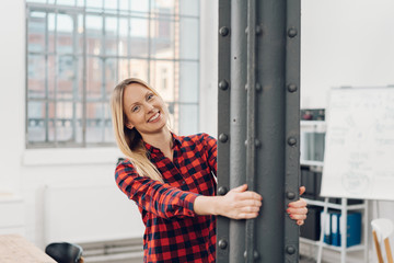 Wall Mural - Happy smiling businesswoman in a modern office