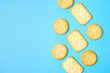 Crackers on solid light blue color background with copy space