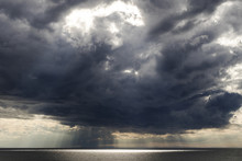 Scenic View Of Storm Clouds Over Sea