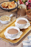 Fototapeta Pomosty - Milk tea on wooden table