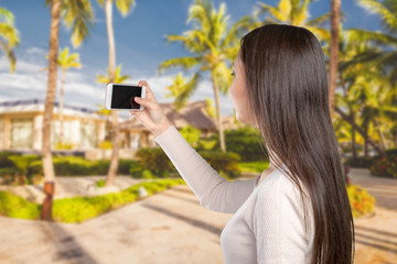 Joyful young women making selfie by her smart phone