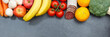 Obst und Gemüse Sammlung Lebensmittel Früchte essen Banner Schieferplatte Textfreiraum von oben