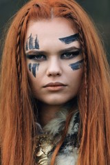 Warrior woman portrait, viking war makeup