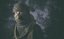 Masked Criminal Portrait With Grungy Background Concept