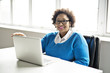 © Louis-Paul Photo - Portrait of cheerful business African-American working on laptop