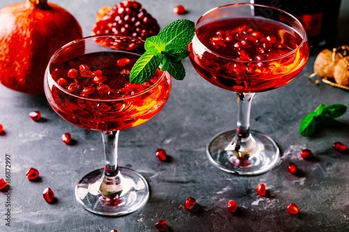 Cuadros en Lienzo red cocktail with champagne and pomegranate seeds