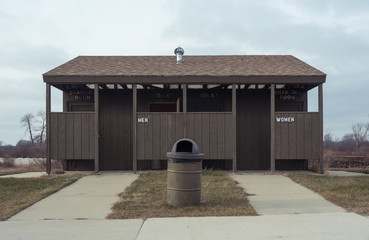 wooden restroom and changing room in a park
