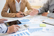 © Freedomz - Business people discussing the charts and graphs showing the results of their successful teamwork, business concept