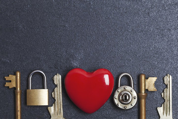Wall Mural - Valentines unlock love concept. Red heart with padlock and key