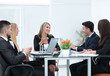 © ASDF - business partners discussing a financial transaction