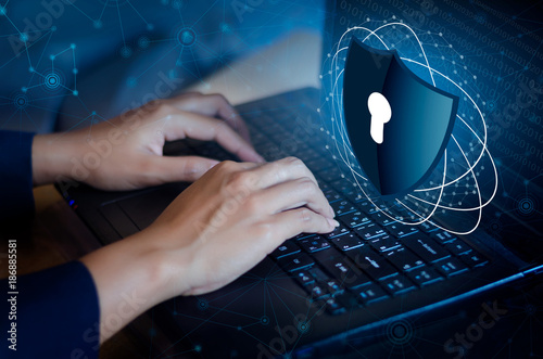 Fotografía Press enter button on the keyboard computer Shield cyber Key lock security syste
