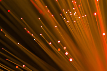 Red optical fibre close up macro shot for background image .