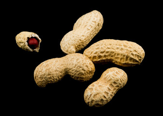 Peanuts isolated on black background