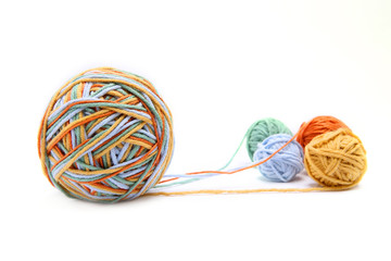 Wall Mural - colorful big thread ball from four color thread. cotton thread balls isolated on white background. d