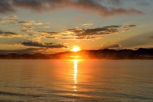 Sunrise At Yellowstone Lake - A Late August Morning, The Sun Rises Over The Foggy Yellowstone Lake, Yellowstone National Park, Wyoming, USA.