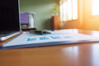 © A NON - Pen,keyboard,calculator,report graph chart on office table,for Business.