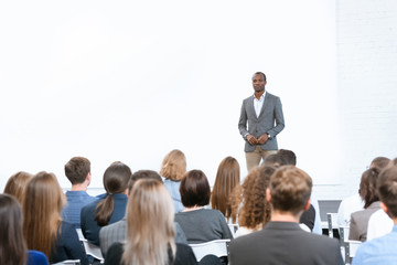 african man standing against copy space at meeting