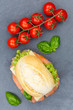 Brötchen Sandwich Baguette belegt mit Fisch Lachs Hochformat von oben Schieferplatte