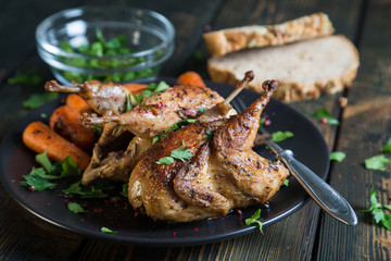 Canvas Print - Fried quail with carrots and fresh parsley