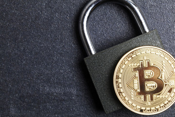 Poster - bitcoin security concept. Gold coin with padlock