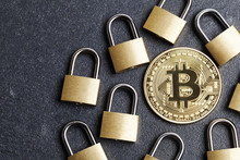 Bitcoin Security Concept. Gold Coin With Padlock