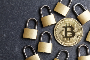 Poster - bitcoin security concept. Gold coin with padlock