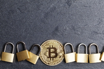 Poster - bitcoin security concept. Gold coin with padlock