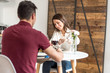 © DavidPrado - Happy young couple eating and drinking wine at home