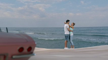 Wall Mural - young couple on summer beach