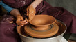 © Aleksandra Jankovic/Stocksy - Woman Working On Pottery Wheel