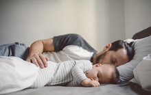 Man Sleeping With His Baby