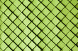 © Amy Covington/Stocksy - Green paper tile background
