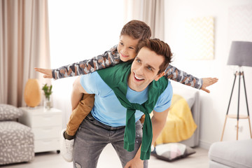 Poster - Father and son having fun at home