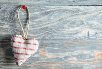 Canvas Print - Heart from cloth on wood background