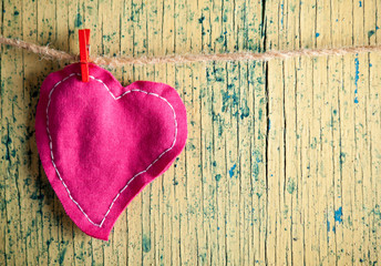 Canvas Print - Heart from cloth on wood background