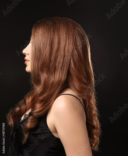 Young Woman With Caramel Hair Color On Black Background Buy This Stock Photo And Explore Similar Images At Adobe Stock Adobe Stock
