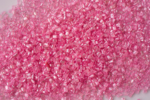 Closeup Of A Pile Of Pink Sugar Crystals (cake Decor), From Above