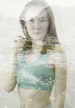 Portrait Of A Young Woman With The Effect Of Double Exposure. Combination Of A Picture Of Nature And A Young Woman.