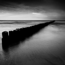 Sunset Over The Sea With A Wooden Pier, Black And White Photo, Long Exposure