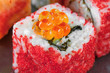 © Oksana - California rolls with salmon ROE and flying fish with eel and Philadelphia cheese closeup. Macro.