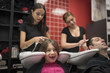 © FotoAndalucia - Hairdressers with little girls and man. Father and daughter at hairdresser