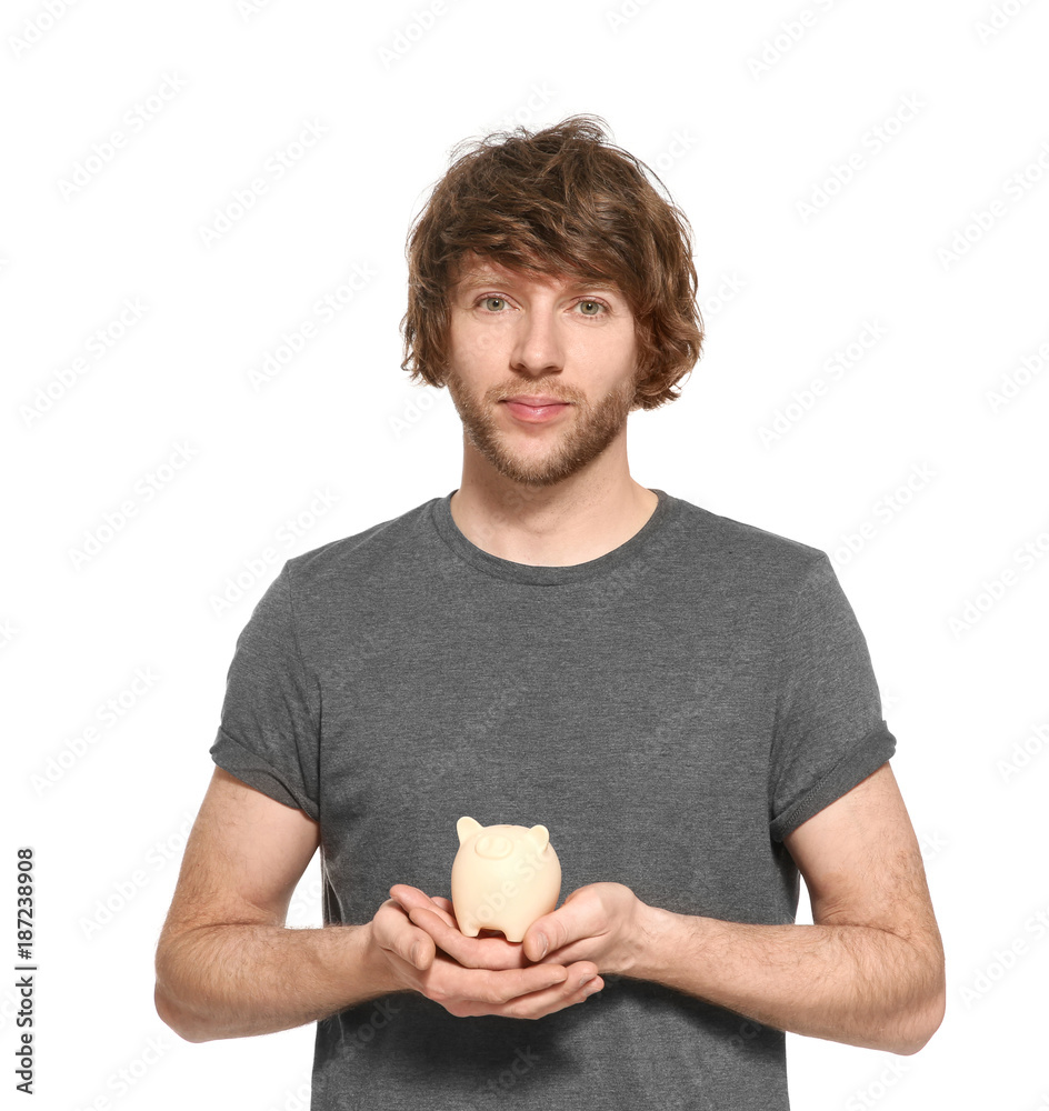 Man holding piggy bank on white background