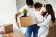 © NDABCREATIVITY - Family moving into their new home